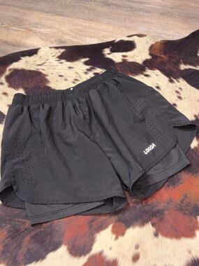 Woman’s 2in1 Athletic Layered Shorts mesh biker inside. zip pocket. Running